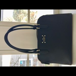 Kate Spade black leather shoulder hand bag.